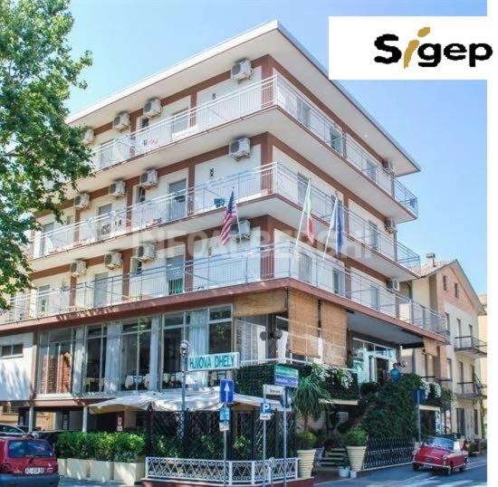 Hotel Nova Dhely Римини Экстерьер фото